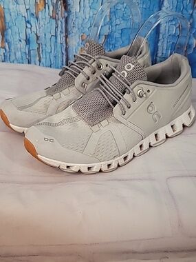 On Running Athletic Shoes in Light Gray